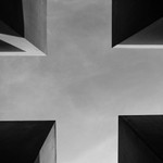 Minimalist black and white photograph emphasizing modern architectural design.